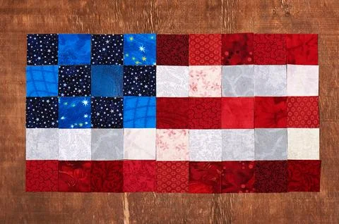 Square pieces of fabrics lying like a flag of USA Fotos de archivo