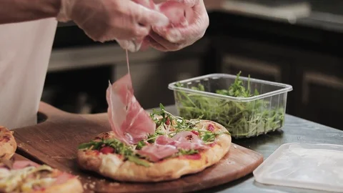 Square pizza with Parma ham Video stock 129817140