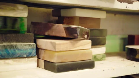 Square polished samples of wood, epoxy resin and mixed wood with epoxy resin in Stock Footage 263055155