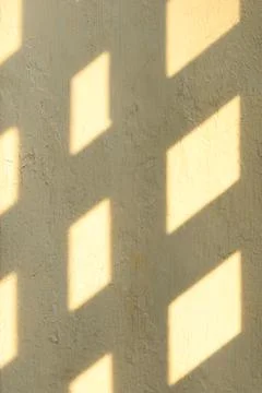 Square shadow on wall over the sunrise Foto stock