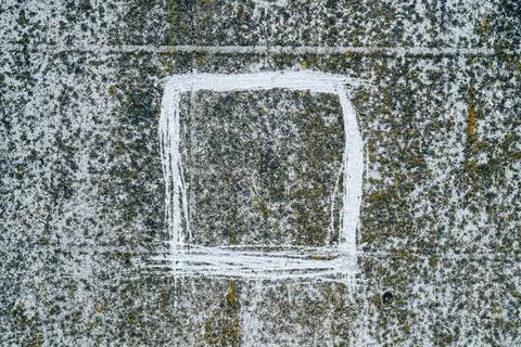 Square shape scratching on a concrete wall as background Stock Photos