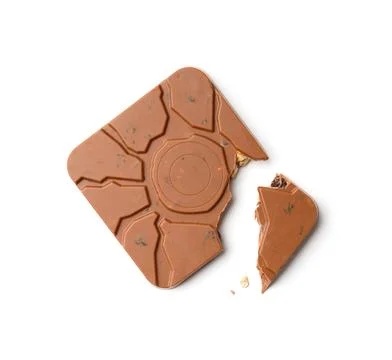 Square shaped chocolate with a broken corner on a white background, flat la.. Stock Photos