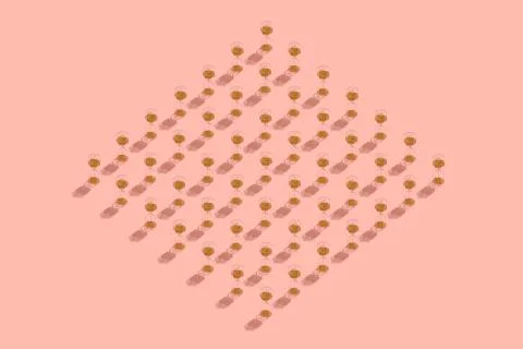 Square shaped sand clock pattern on pink background Stock Photos