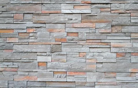Square stone wall close Stock Photos