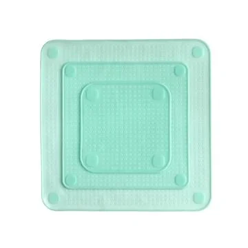 Square stretchable silicone covers isolated on white background in close-up Stock Photos