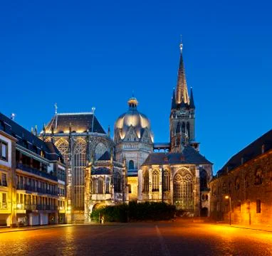 Square version of the cathedral of Aachen, Germany with night blue sky. Stock Photos