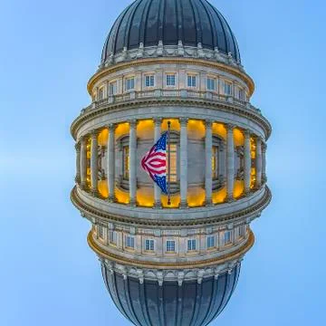 Square Vertical reflection capital building dome and flag Stock Photos