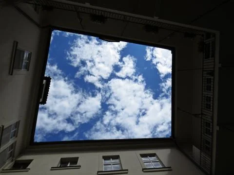 Square View at Cloudy Sky from Yard Quad Thorough Apartment Building of Flats Stock Photos