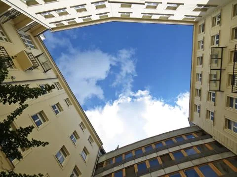 Square View at Cloudy Sky from Yard Quad Thorough Apartment Building of Flats Stock Photos