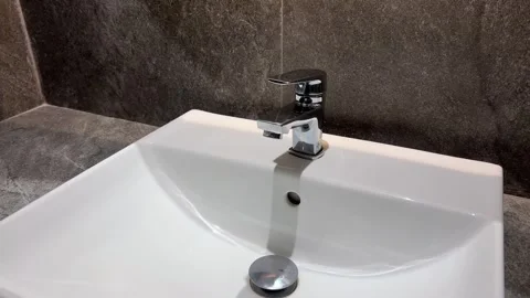 Square white sink with marble grey wall rectangular wash basin Vídeos de archivo 306278067
