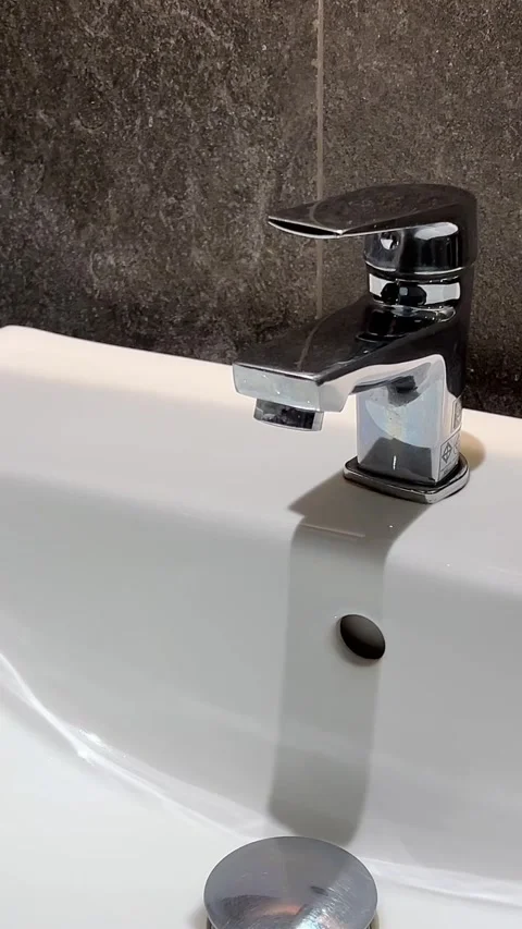 Square white sink with marble grey wall rectangular wash basin Stock Footage 306944987