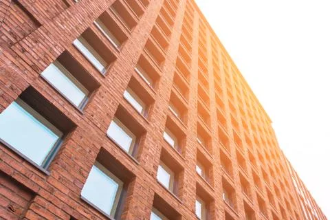 Square windows in a red brick building Stock-Fotos