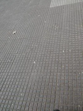 Squared concrete background with different elements in street in daylight 스톡 사진