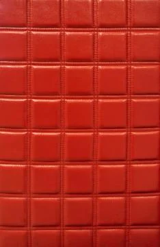 Squared red leather texture with contrast light Stock Photos