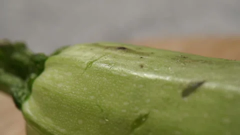 Squash is being cut into pieces with knife Stock Footage 113495073