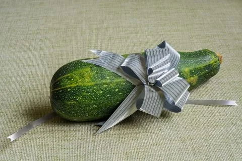 Squash with a bow. Stock-Fotos