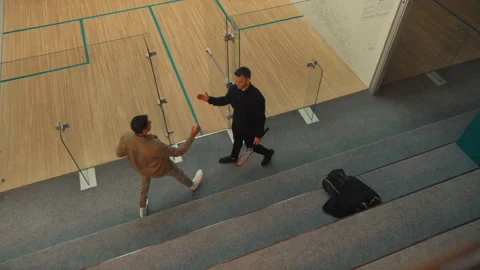 Squash players meet before the game Stock Footage 278981319