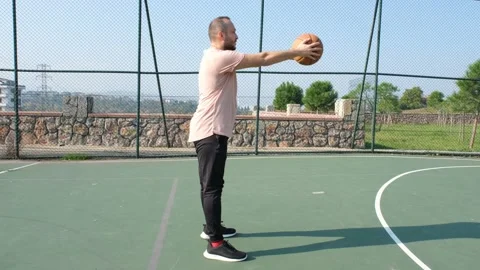 Squat with basketball Stock Footage 168760265