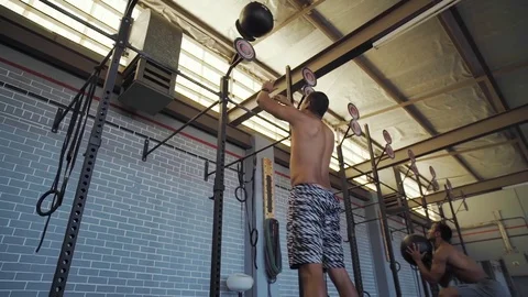Squat throw workout Stock Footage 71616413