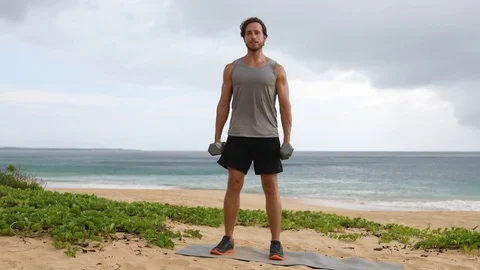 Squats fitness exercise - man doing Dumbbell Squats workout Stock Footage 79849558