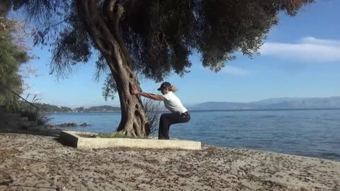 Squats on the seashore Video stock 308367415
