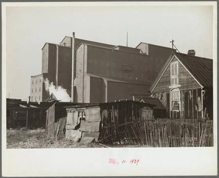 Squatters shacks with grain elevator in background, Saint Louis, Missouri ... Stock Photos