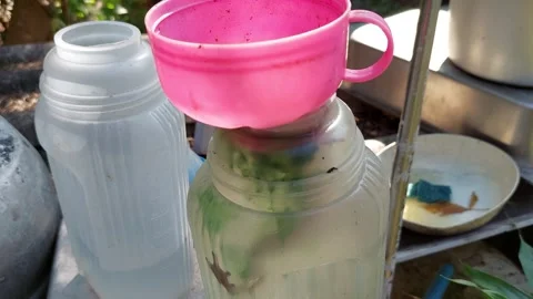 The squeegee tries to get out of the water jar Stock Footage 259173797