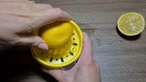 Squeeze lemon juice Stock Footage 166637241