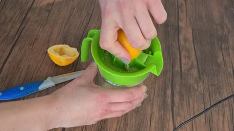 Squeeze Lemon Juice Stock Footage 231033515
