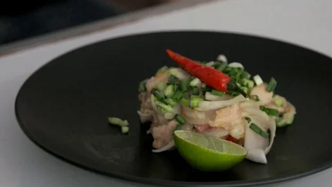 ​ squeeze lemon in the kitchen Stock Footage 74236422