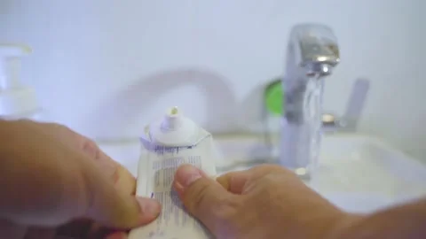 Squeeze Out Last Bit of Tooth Paste Video stock 158622619