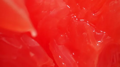 Squeezed juicy grapefruit. Macro shot. 스톡 동영상 130397193