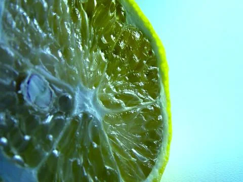 Squeezed old lemon on a white background. Stock Photos