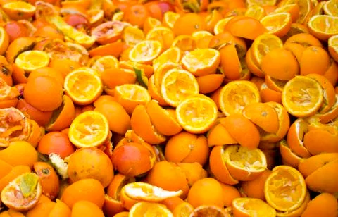 Squeezed oranges Stock Photos