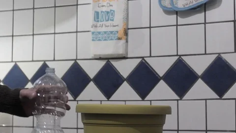 Squeezed plastic bottle Stock Footage 81965088