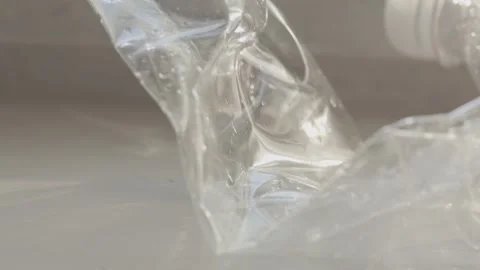 Squeezed Plastic Bottle on Windowsill: Recycling Concept Stock Footage 249422296