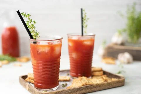Squeezed tomato fresh with crackers Stock Photos