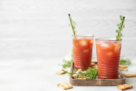 Squeezed tomato fresh with crackers Stock Photos