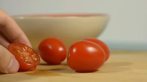 Squeezes cherry juice on a table Stock Footage 128917771
