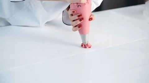 Squeezes homemade marshmallows Stock Footage 73020532