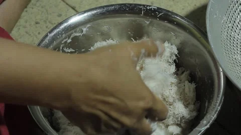 Squeezing coconut milk Stock Footage 286105544