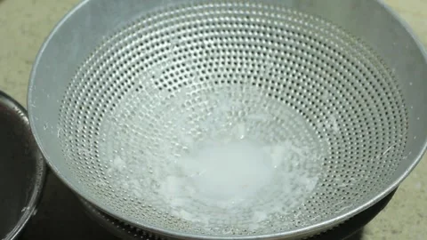 Squeezing coconut milk Stock Footage 286105546