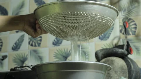 Squeezing coconut milk Stock Footage 286106130