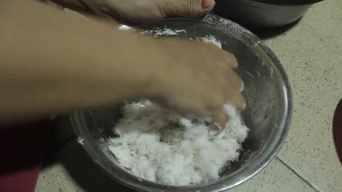 Squeezing coconut milk Stock Footage 286106766