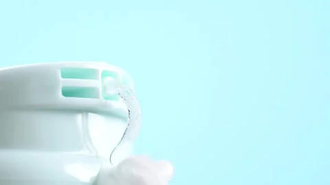 Squeezing gel from the bottle, macro. Cleansing Gel, shaving gel. Stock Footage 284222434