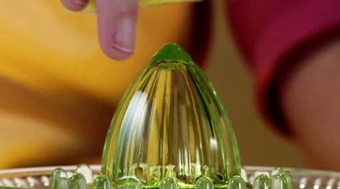 Squeezing a grapefruit (close-up) Stock Footage 8573754