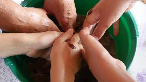 Squeezing grapes Stock Footage 116333991