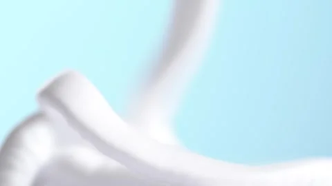 Squeezing hair foam mousse, macro. Close up of white cloud of hair mousse o.. Stock Footage 284222408