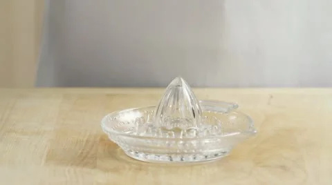 Squeezing half a lemon Stock-Footage 24665794