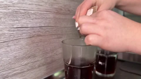 Squeezing Last Drops from Drip Coffee Filter by Hand Stock Footage 310353020